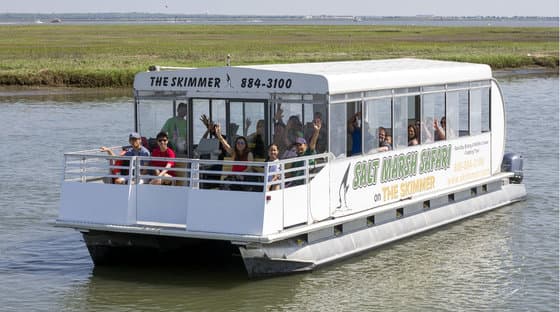 the salt marsh skimmer boat in cape may, nj out on the water with happy customers