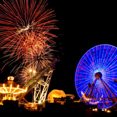 Fireworks and big ferris wheel at night at Morey's Piers boardwalk in Wildwood NJ