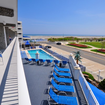 Balcony overlooking sundeck and Wildwood beach at Armada By the Sea