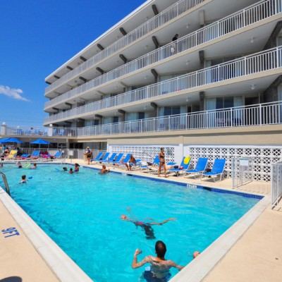 Guests swimming in Armada By the Sea's oceanfront pool in Wildwood NJ